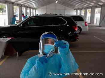 Houston plans to launch web portal for scheduling second doses of COVID-19 vaccine - Houston Chronicle