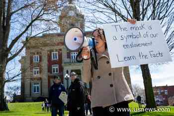 Agents Visit Home of Pink Hat Woman Pictured at Capitol Riot
