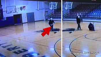 Security Camera Catches Custodian Hitting Trick Shot While Cleaning Basketball Gym