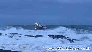 Fishing vessel with five on board rescued seconds from crashing onto rocks
