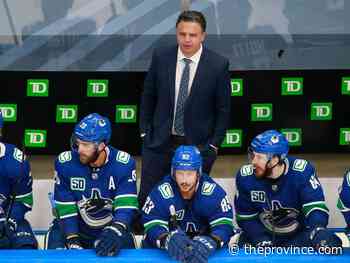 Canucks bench boss Travis Green digging through his coaching bag - The Province