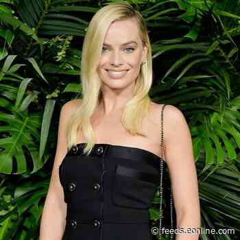 Margot Robbie Looks Unrecognizable With Jet Black Hair on the Set of Her New Movie