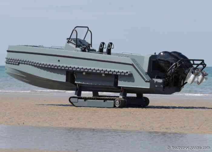 French military amphibious craft uses caterpillar tracks to move in an out of water