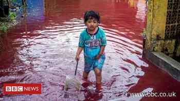 Village submerged by red water after flood hits batik factory