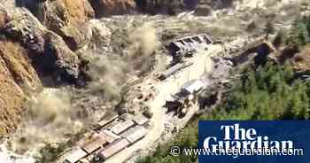 Scores feared dead after glacier causes dam burst in India – video