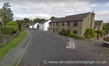 Man who crashed into a house had knife in the footwell of his car
