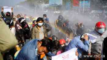 Police in Myanmar crack down on crowds defying protest ban
