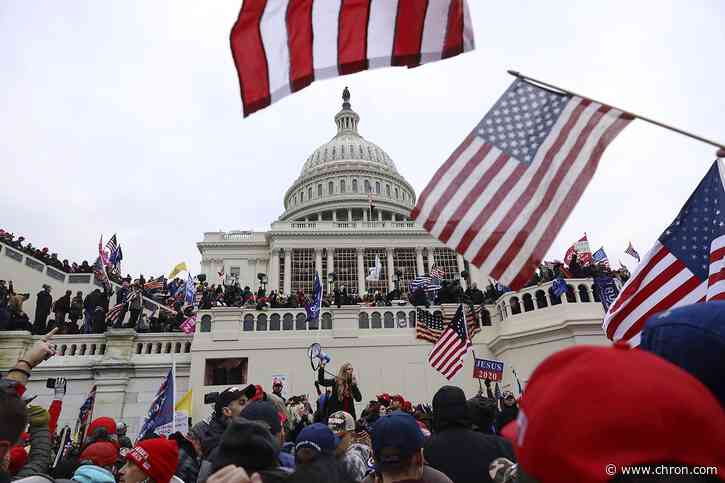 Man charged in US Capitol riot worked for FBI, lawyer says
