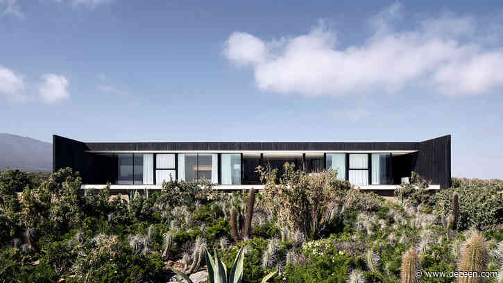Architect builds his own house clad in blackened pine in Chile