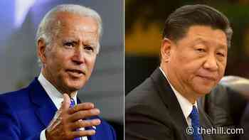 Biden takes cautious tack on China as tensions simmer
