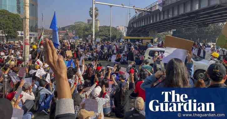 Myanmar protests: woman shot in head as police response escalates