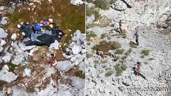 Three people rescued from deserted island where they lived off coconuts for 33 days