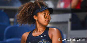 Naomi Osaka pauses midmatch to bring butterfly to safety at Australian Open