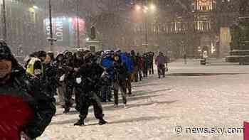 Fury over photo of 200 homeless people queuing for food amid freezing weather in Glasgow - Sky News