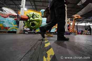 Virus-muffled Mardi Gras hits New Orleans' party-loving soul