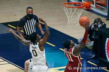 Reaves Lifts No. 12 Oklahoma Over No. 14 WVU 91-90 in 2OT