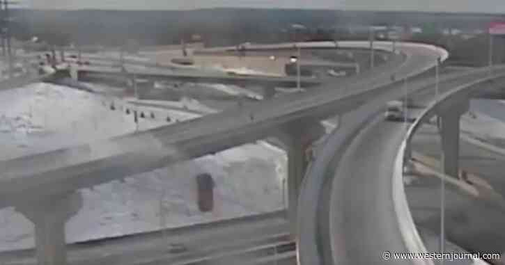 Watch: Driver Miraculously Survives 70-Foot Plunge Off a Highway Overpass