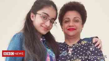 Woman charged over Burnley doctor and daughter deaths