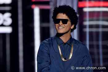 Woman scammed out of $100K after believing man was Bruno Mars - Chron