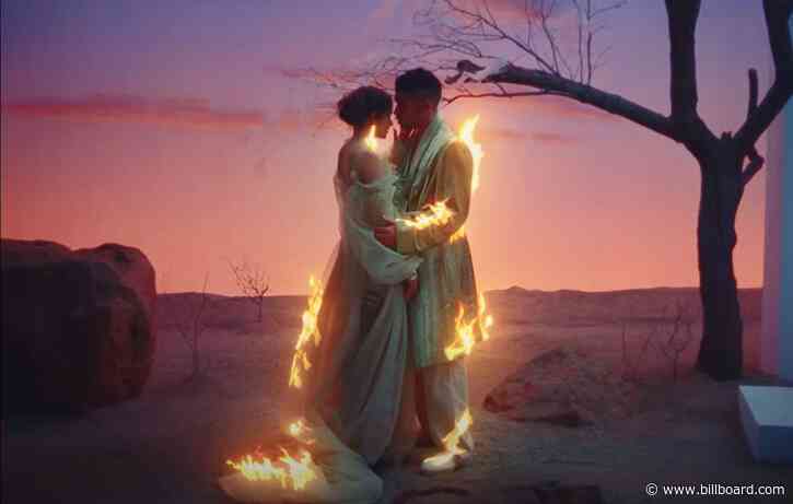 Bad Bunny Burns for Rosalia in Romantic ‘La Noche De Anoche’ Video: Watch