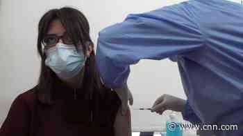 Country convulsed by protests begins vaccination campaign