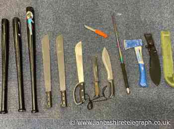 Police batons, knives and axe seized by police during drugs raid at Lancashire home