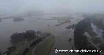 Northumberland river splits in two after overtopping its banks during heavy rain