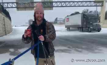 Yes, someone actually went skiing down Houston's I-10 in this weather