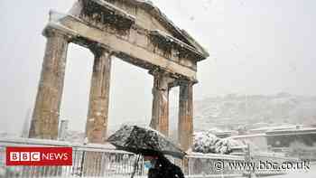 In pictures: Greece's Acropolis blanketed in snow