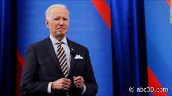 Biden says life may be back to normal by Christmas 2021