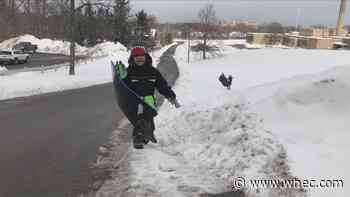 Kids enjoy the snowy February Break with some sledding