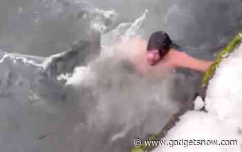 Watch: Man jumps into freezing water to save his iPhone XS