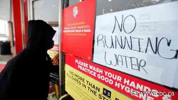 Texas power outages below 500,000, but water crisis persists during deep freeze