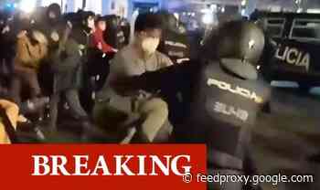 Spain riots erupt: Valencia chaos as police clash with protesters in angry demonstration