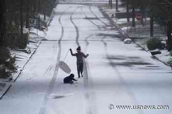 The Latest: at Least 40 Dead Due to Extreme Weather in US