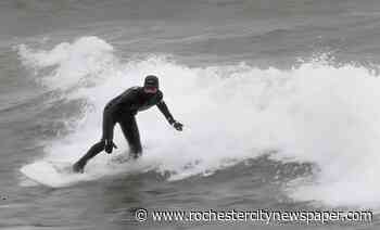 Surfer takes on Great Lakes and winter storms
