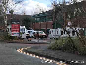 Travellers set up encampment outside newspaper's offices - The Bolton News