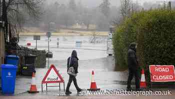Heavy rain brings flooding and travel disruption to parts of UK
