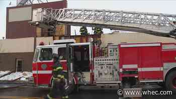 Fire at auto repair shop put out despite issues with frozen hydrant