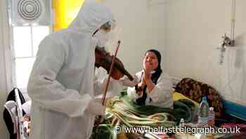 Fiddler on the wards: Violin-playing doctor cheers Covid patients in Tunisia