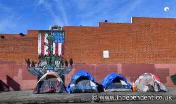 Seize the hotels: Activists call for LA mayor to open hotels to homeless as five a day die on streets