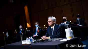 Garland seeks to draw sharp contrast with Trump-era DOJ