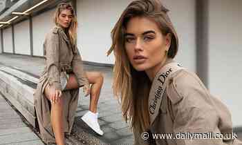 Love Island's Arabella Chi showcases her slender pins as she dons a trench coat for photoshoot