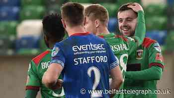 Conor McMenamin fires Glentoran back into title race with last gasp win over Linfield