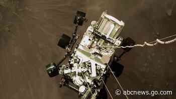 Mars landing team 'awestruck' by photo of descending rover