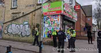 Beverley Road street 'sealed off' by police searching bins
