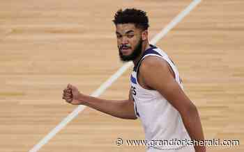 Karl-Anthony Towns soldiers on after another Timberwolves coaching change - Grand Forks Herald