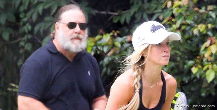 Russell Crowe & Girlfriend Britney Theriot Couple Up for Tennis Match in Sydney