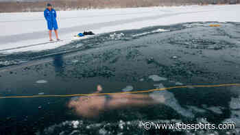 Czech free-diver breaks world record for longest swim under ice