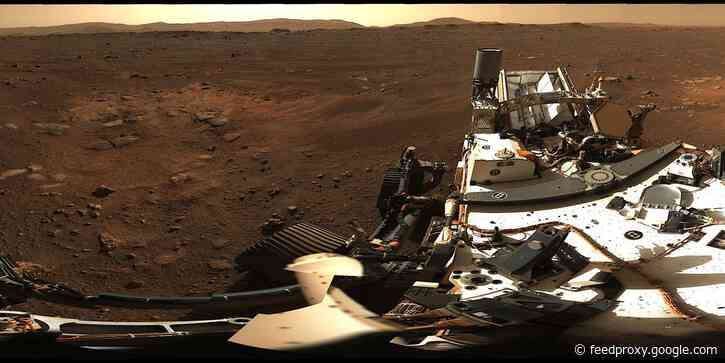 Stunning photos from NASA's new Mars rover reveal 200-foot cliffs, mysterious rocks, and a perfect touchdown